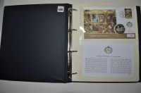 Lot 1291 - A set of twelve silver coins in covers...