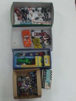 Lot 8 - A collection of toy cars, including:...