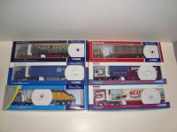 Lot 103 - Six Corgi articulated die-cast vehicles,...