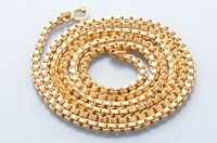 Lot 757 - An 18ct. yellow gold box link chain, of...