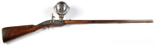 Lot 908 - A ball over barrel muzzle loading air rifle,...