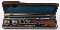 Lot 912 - A cased single shot ball reservoir air...