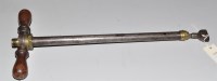 Lot 935 - An antique steel and brass air rifle stirrup...