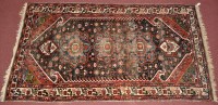 Lot 1109 - A Bakhtiari rug, the central field decorated...
