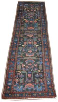 Lot 1132 - A Hamadan runner, decorated with geometric...