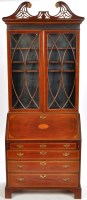 Lot 1176 - An Edwardian inlaid mahogany bureau bookcase,...
