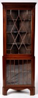 Lot 1184 - An early 19th Century mahogany standing corner...