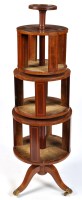 Lot 1193 - An Edwardian inlaid mahogany four-tier...