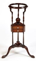 Lot 1243 - A George III style basin stand, the moulded...
