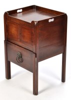 Lot 1303 - A George III mahogany commode, the square top...