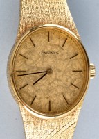 Lot 942 - Longines: a 1970's lady's 18ct. bracelet watch,...