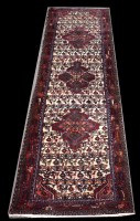 Lot 1245 - A Tafresh runner, with triple medallion design...