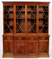 Lot 1308 - A George III style mahogany breakfront...