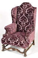 Lot 1327 - An early 20th Century Jacobean style wing back...