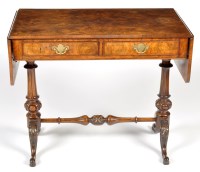 Lot 1360 - A Recency style burr walnut drop leaf sofa...