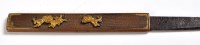 Lot 439 - A Japanese kogai, the single edged signed...