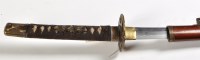 Lot 448 - A Japanese katana, the curved single edged...