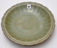Lot 491 - Large Longquan celadon type fluted dish, the...