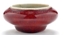 Lot 501 - Small flambé glaze brush washer, of squat form...