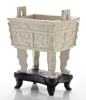 Lot 537 - Blanc-de-chine archaistic vessel, fang ding,...