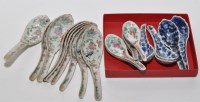 Lot 549 - Fourteen famille rose ladles and five...