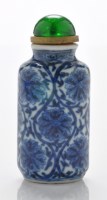 Lot 559 - Blue and white 'Indian lotus' cylindrical...