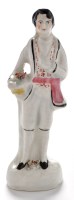 Lot 860 - A rare 19th Century earthenware figure, by...