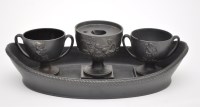 Lot 984 - *Wedgwood basalt desk stand, the oval shaped...