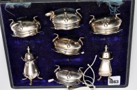 Lot 1063 - A George V condiment set, Birmingham and...