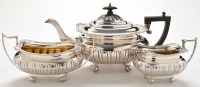 Lot 1077 - A George V three piece tea service, by J...