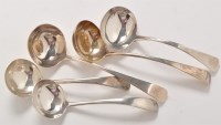 Lot 1104 - A pair of George III sauce ladles, by Thomas...