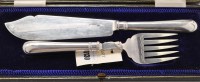 Lot 1130 - A pair of George V Silver fish servers, by...