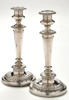 Lot 1141 - A pair of George IV candlesticks, by Smith,...