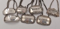Lot 1151 - A pair of George IV silver decanter labels, by...