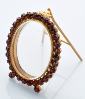 Lot 1156 - A Victorian garnet and yellow metal miniature...