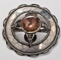 Lot 1159 - A Scottish mid 19th Century white metal plaid...