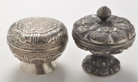 Lot 1160 - A 20th Century embossed white metal bowl and...