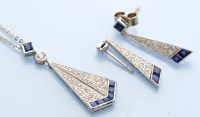 Lot 1294 - A sapphire and diamond pendant, of inverted...