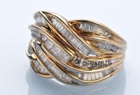 Lot 1302 - A diamond dress ring, set throughout with...