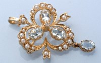 Lot 1303 - An aquamarine, seed pearl and diamond...