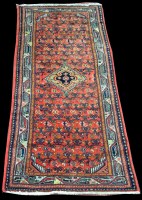 Lot 1353 - A Toyserkan runner, the central diamond shaped...