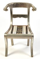 Lot 1410 - *An Anglo Indian silver coloured metal covered...