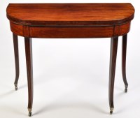 Lot 1424 - *A late George III mahogany D-shaped turnover...