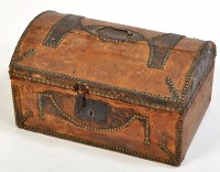 Lot 1426 - *A hide covered metal-bound studwork dome top...