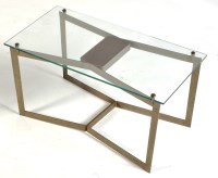 Lot 11 - A mid 20th Century bent metal and plate glass...