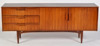 Lot 18 - A 1960's Danish style walnut sideboard, fitted...