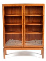 Lot 66 - A mid 20th Century teak and glazed display...