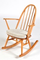 Lot 95 - An Ercol light elm and beech wood stick back...