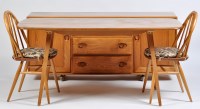 Lot 96 - An Ercol light elm dining room suite,...
