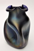 Lot 144 - A Loetz style irredescent vase, wavy rim and...